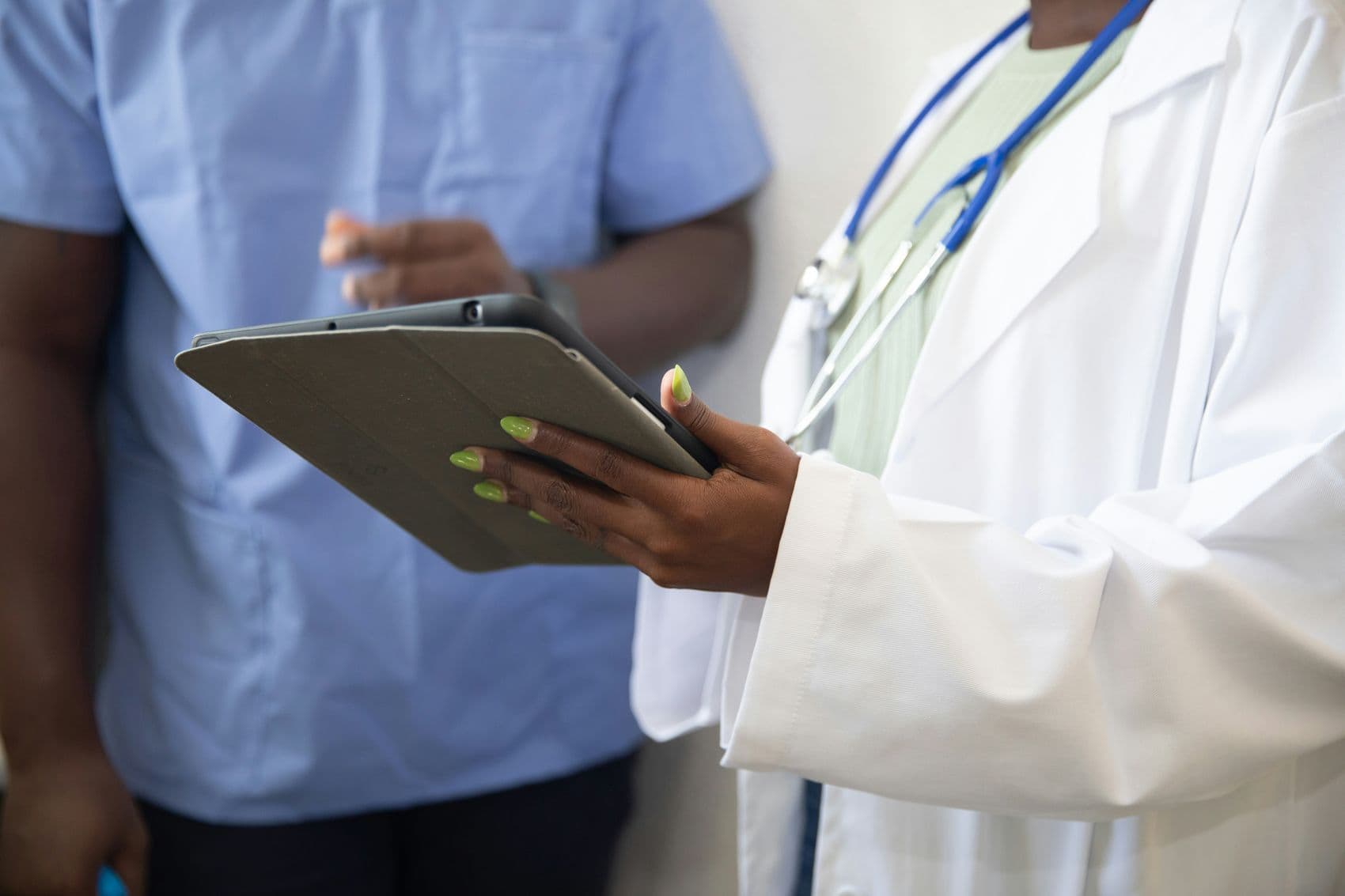 A provider discussing a care plan with a patient
